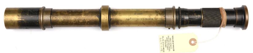A WWI sighting telescope of black lacquered brass, marked with broad arrow, Vickers Ltd, 1915, No