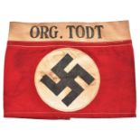 A Third Reich Organisation Todt cloth armband, comprising NSDAP party armband with narrow sewn on