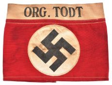 A Third Reich Organisation Todt cloth armband, comprising NSDAP party armband with narrow sewn on