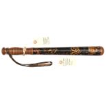 A Vic black painted truncheon, with gilt, red and white crown, VR cypher with flourishes and