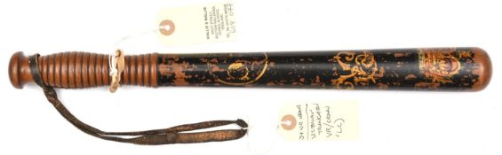 A Vic black painted truncheon, with gilt, red and white crown, VR cypher with flourishes and