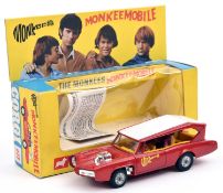 A Corgi Toys Monkeemobile (277). The Monkees Monkeemobile in red with 4 band members inside. Boxed