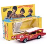 A Corgi Toys Monkeemobile (277). The Monkees Monkeemobile in red with 4 band members inside. Boxed