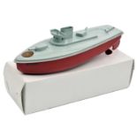 A very late issue Sutcliffe tinplate clockwork SNAPPY Naval gun boat. In light grey and red