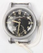 A late WWII Timor WWW military issue wristwatch, numbered K11381/41281, black dial with subsidiary