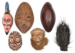 5 various face masks: Duk-Duk spirit dancer, Tulai tribe, Papua N. Guinea (label inside) painted top