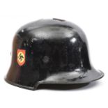 A Third Reich Fire Police double decal steel helmet, smooth black painted skull with the aluminium
