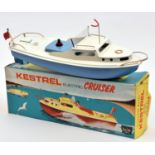A Sutcliffe tinplate electric Kestrel Cruiser. In white and light blue livery, with propeller and