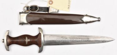 A Third Reich SA dagger, the blade with pre 1935 Eickhorn mark, hilt with nickel silver mounts,