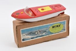 A scarce Sutcliffe MINX clockwork Speedboat. A red and white plastic example with yellow hatch