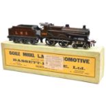 A Bassett-Lowke clockwork O gauge LMS locomotive (3302/0). A Standard compound 4-4-0 tender loco,