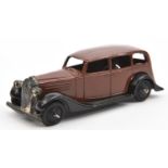 Dinky Toys 30 Series Vauxhall (30d). In dark brown with closed black chassis, black ridged wheels