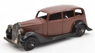 Dinky Toys 30 Series Vauxhall (30d). In dark brown with closed black chassis, black ridged wheels