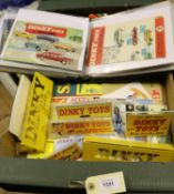 A collection of original and reproduction mostly Dinky range Catalogues, card display material and