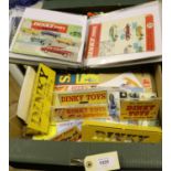 A collection of original and reproduction mostly Dinky range Catalogues, card display material and