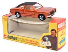 A Corgi Whizzwheels Ford Cortina GXL 'Graham Hill' (313). An example in metallic bronze with black