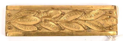 A gilt belt slide of The 87th Prince of Wales's Own Irish Fusiliers, bearing 10 battle honours "