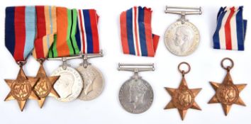 WWII group of 4: 1939-45 star, Africa star, Defence, War, GVF; another group of 4: 1939-45 star, F &