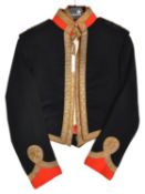 An officer's blue mess jacket, scarlet facings, gilt lace trim, Captain's shoulder cords with ERII R