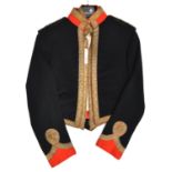 An officer's blue mess jacket, scarlet facings, gilt lace trim, Captain's shoulder cords with ERII R