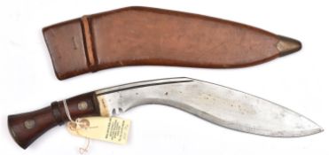 A WWII military kukri, blade 12”, with short back fuller, stamps at forte (partly erased), wooden