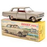 A French Dinky Toys Open Rekord (542). In metallic grey with red interior and spun wheels. Boxed,