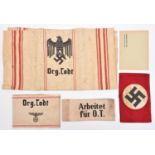 A red striped unbleached linen towel, printed in black with large eagle and swastika over “Org
