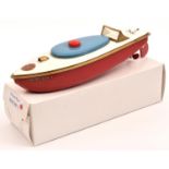 A very late issue Sutcliffe tinplate clockwork RACER 1 speed boat. In white and red livery, with