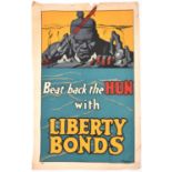 A WWI US coloured poster “Beat Back the Hun with Liberty Bonds” showing head and shoulders of ugly