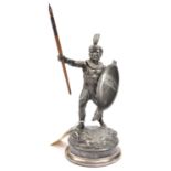 A Vic pewter rowing prize desk ornament, in the form of an African warrior in feathered helmet,