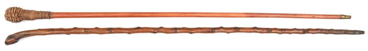 A slender malacca walking cane, cord woven/bound, knopped grip, brass ferrule, 33” overall; and a