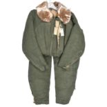 A scarce pre WWII Imperial Japanese Air Force fur lined winter flying suit, with printed label.