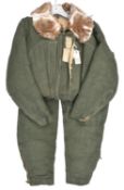 A scarce pre WWII Imperial Japanese Air Force fur lined winter flying suit, with printed label.