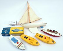 4x Sutcliffe tinplate boats. 2x Comet speedboats in yellow. A Tiger speedboat in blue and white.