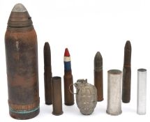An inert WWI 18 pounder shell, in good fired condition, markings visible but faint, dated “1/16”,