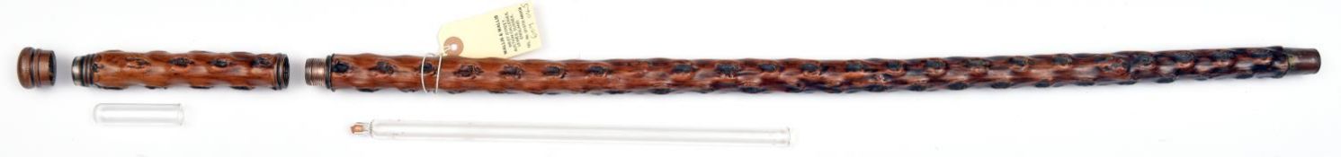 A toper's knopped walking cane, with en suite grip which unscrews to reveal a 10” spirit flask,