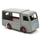 A scarce Dinky Toys N.C.B. Electric Van (30V). An example in dark grey with maroon base and wheels
