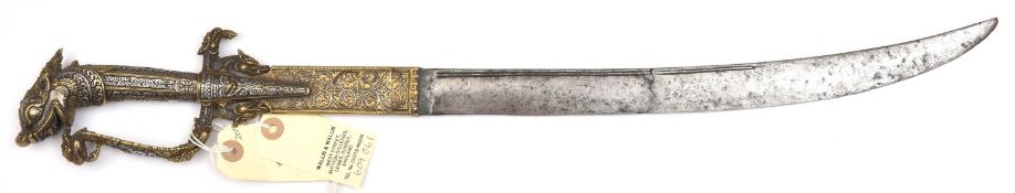 A Ceylonese sword kastane. 19th century, curved SE blade 36cms (cracked), brass hilt and forte