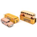 2 Dinky Toys. Luxury Coach (281). Example in cream with orange flash and unusually fitted with red