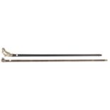 A darkwood walking cane, large embossed WM eagle's head grip, 33½” overall; and a stepped,