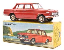 A French Dinky Toys BMW 1500 (534). In red with black tyres and plated wheels. Boxed, minor wear/
