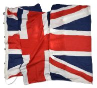 A large Union flag, 4feet 6 in x 9ft 6in, with cord and toggle. GC