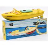 A Sutcliffe clockwork tinplate HAWK speed boat/motor launch. In yellow with green hatch, complete