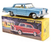 A French Dinky Toys Mercedes-Benz 300SE saloon (533). In metallic blue, with cream interior and spun