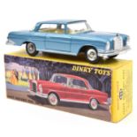 A French Dinky Toys Mercedes-Benz 300SE saloon (533). In metallic blue, with cream interior and spun