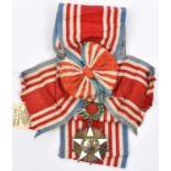 Liberia: Order of African Redemption sash and sash badge, in gilt with 5 pointed white enamelled