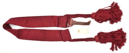 An infantry officer's crimson waistsash and tassels, GC (adjustment strap unstitched)