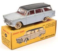 A French Dinky Toys Fiat 1800 Familiale (548). In lavender with black roof, red interior, spun