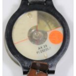 German AK39 pilot's compass. Plastic casing, marked Fl 23235-1, serial 6023. 60mm in diameter,
