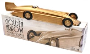 A Schylling Golden Arrow 1929 land speed record car. A tinplate clockwork example from the Schylling